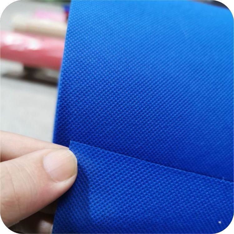 Royal Blue spunbond မဟုတ်သော ယက်မဟုတ်သော အထည်လိပ် ယက်မဂျမ်ဘိုလိပ်အိတ် 70gsm*1.6m*100m